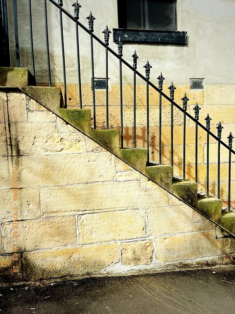 Sandstone steps and iron railing. Made with Isochrome, E Vivid 50.