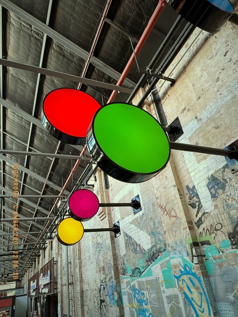 Signal discs hung from the roof structure. Made with Isochrome, C Amber 200.